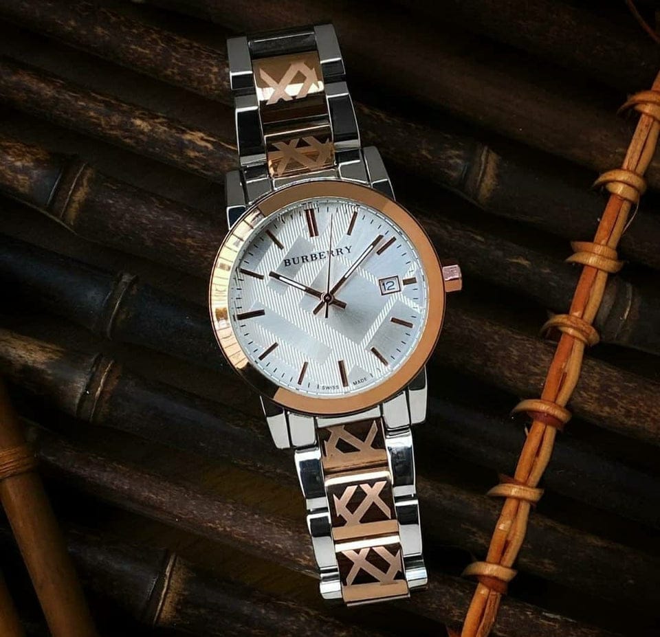Burberry rose gold silver chsin ladies watch